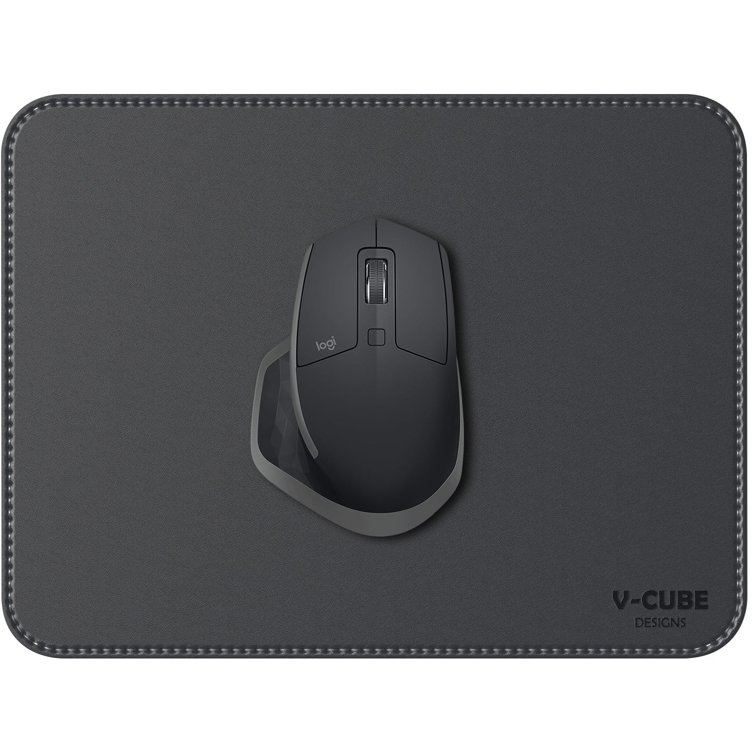 A high quality vegan leather mouse pad for laptop setups placed beside a modern notebook.