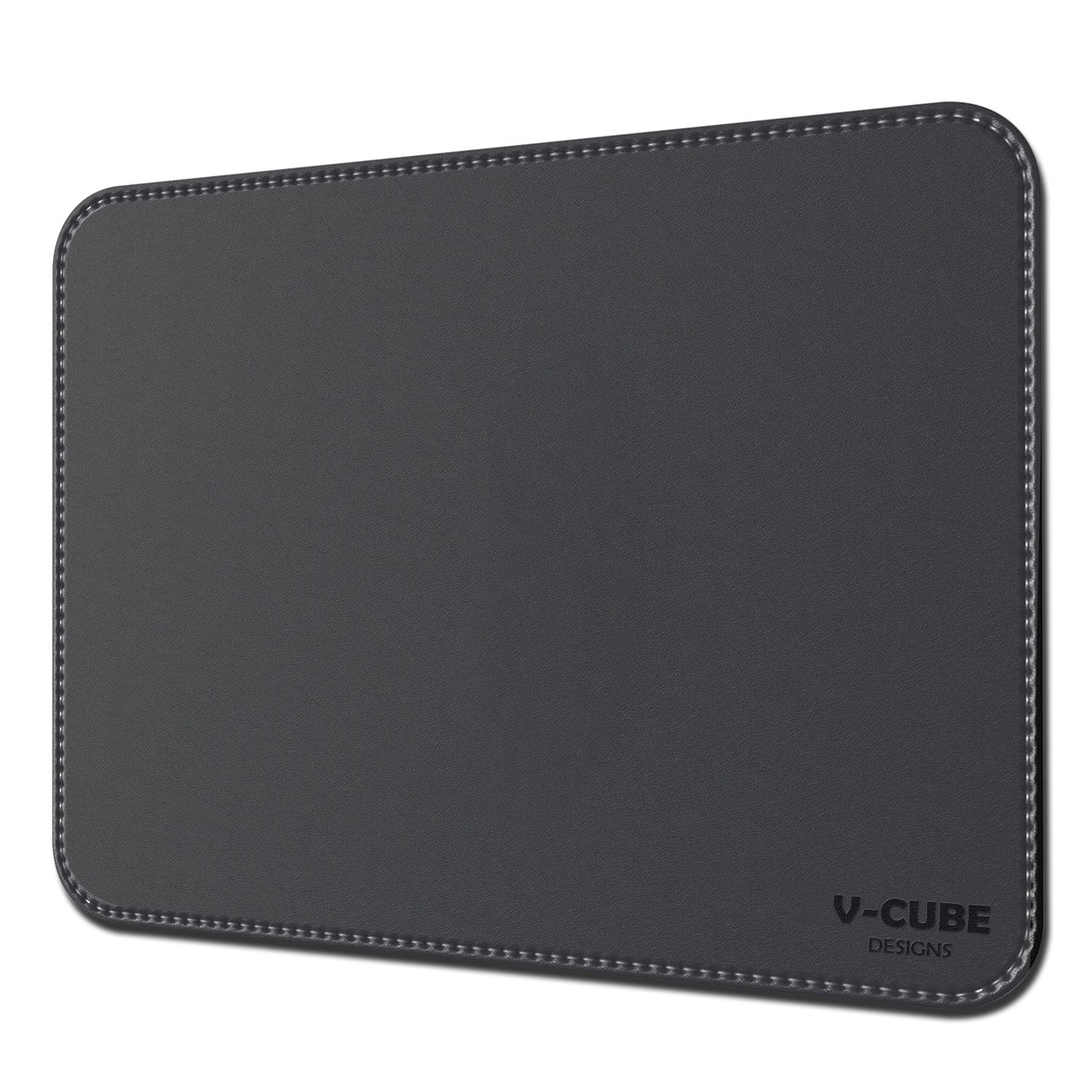 A wireless optical mouse tracking precisely on a smooth mouse pad for laptop work.
