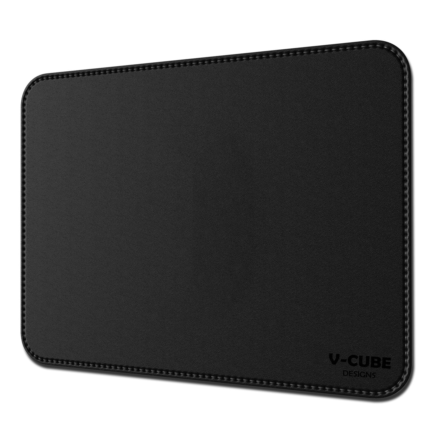 Optical computer mouse gliding effortlessly over a smooth vegan leather mouse pad.